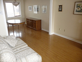 Light coloured laminate flooring in Milton,Ontario.