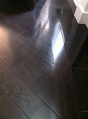 Dark hardwood flooring installed by RE Flooring Ltd.